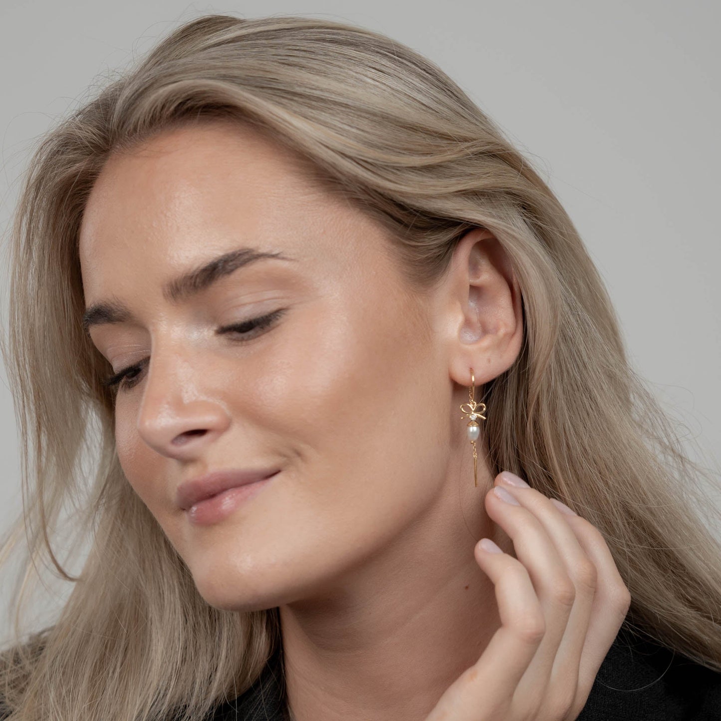 Celebrate Dangle Earring - Polished Gold Plated Sterling Silver with 2 white Cubic Zirkonia