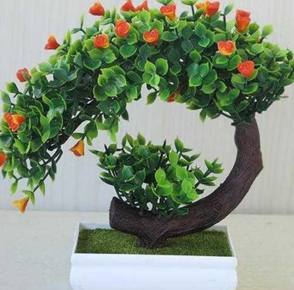 Bonsai aus Plastik mit künstlichen Blumen