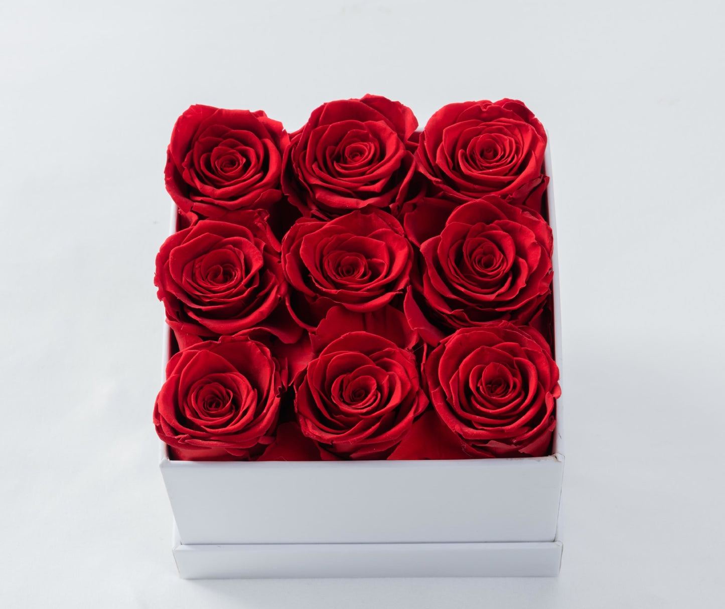 Herzförmiger Blumentopf mit Trockenblumen