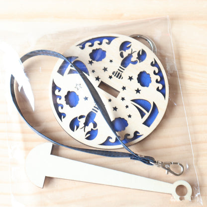 Tragbarer Garnhalter fürs Handgelenk, handgefertigt aus Holz