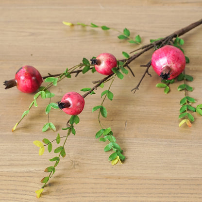 Künstliche Granatapfelfrüchte für Wohnzimmer-TV-Schrank